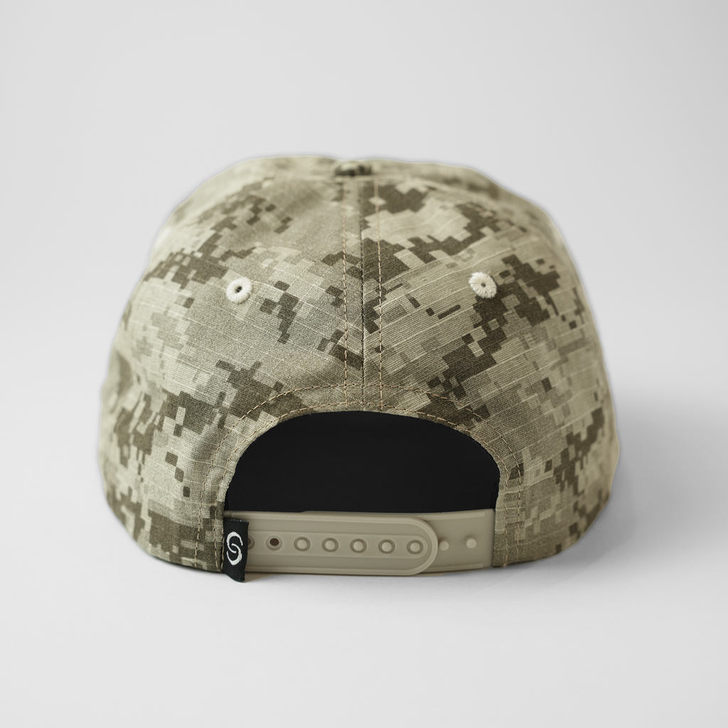 Camouflage baseball cap on a white background