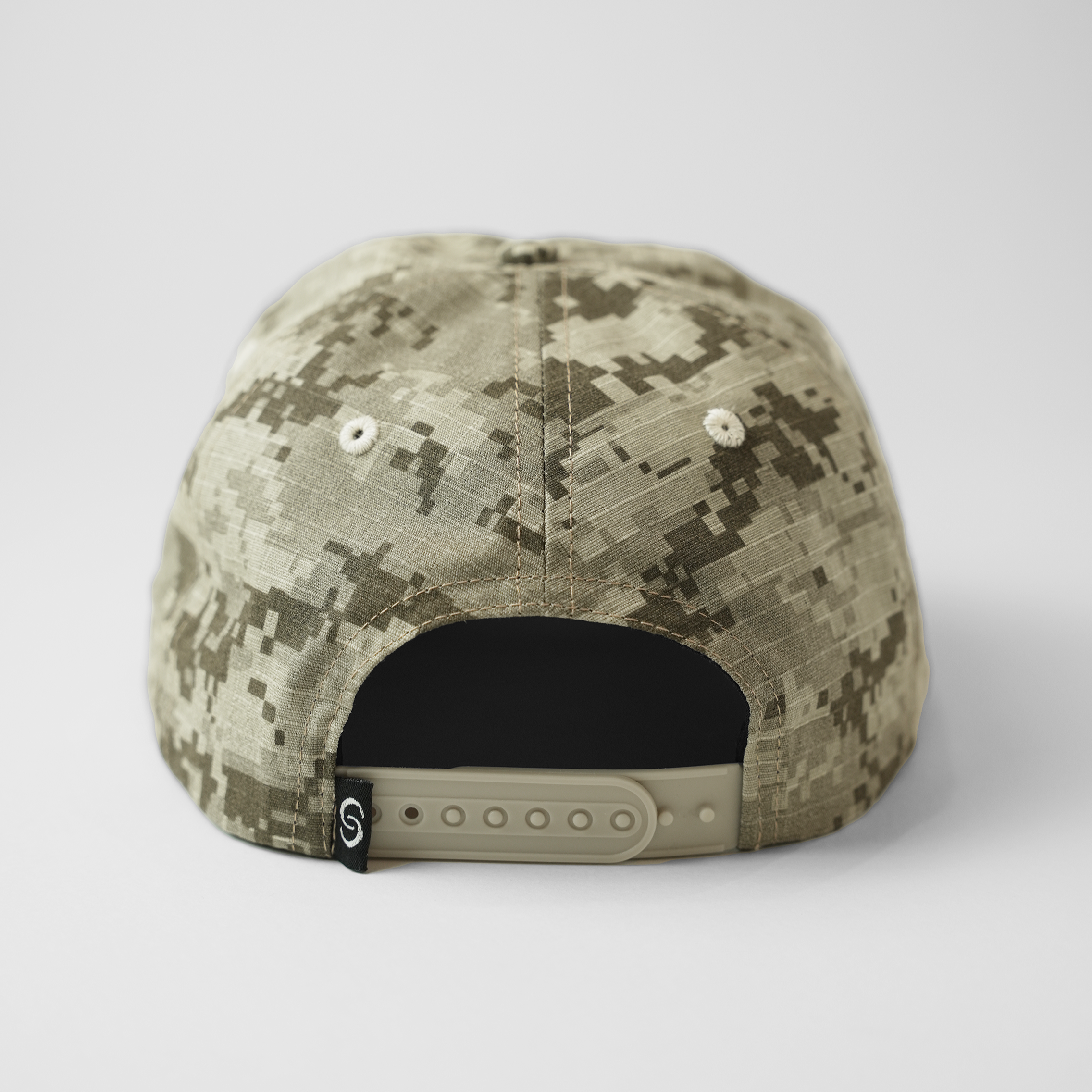 Camouflage baseball cap on a white background